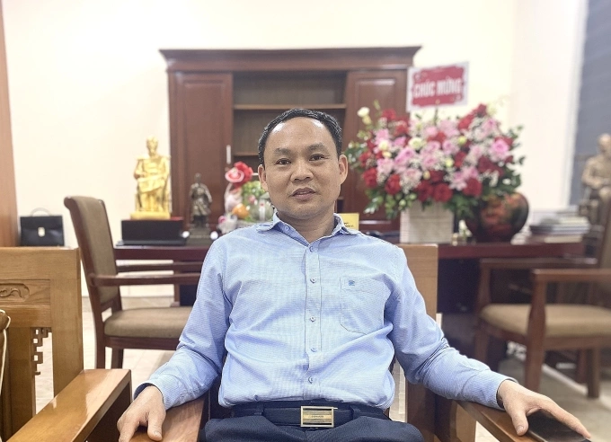 Ông Lê Văn Bính, Bí thư Đảng ủy xã Phượng Dực, nguyên Chủ tịch UBND huyện Phú Xuyên. Ảnh: Quỳnh Nguyễn